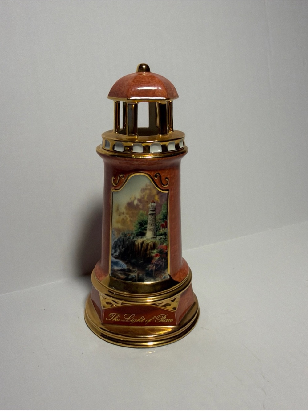 Thomas Kinkade Pink and Gold Lighthouse Figurine